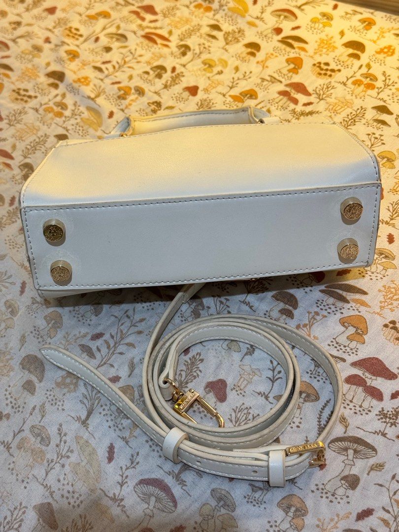 Anne Klein Top Handle Cross Body Bag (Category: Cross-body Bags) located in Cebu City. Submitted by d.cluttering (Listing ID 1413621330, Image 3). Description: — Priced to Sell / open to reasonable offers Anne Klein Top Handle Cross body bag Comes with original strap Small but can fit a lot .