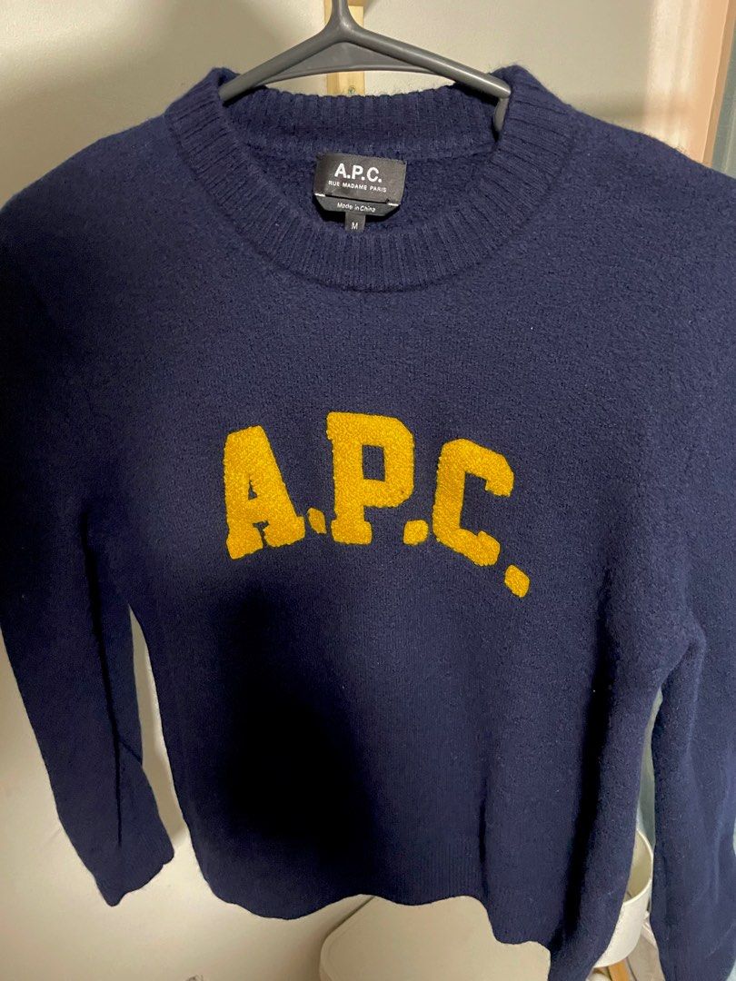 APC Joshua Wool Sweater Dark Navy (preloved) (Category: Tshirts & Polo Shirts ) located in Mandaluyong City. Submitted by mysellingcorner (Listing ID 1413487249, Image 2). Description: APC Unisex Sweater — Medium (fits Small due to slim fit) Color: Navy Blue with Yellow Accents • 100% virgin wool • Crew neck • Contrasting embroidered front logo • Long sleeves • Ribbed cuffs and hem • Straight hem Lightly worn (used once). Purchased for P16,000. S