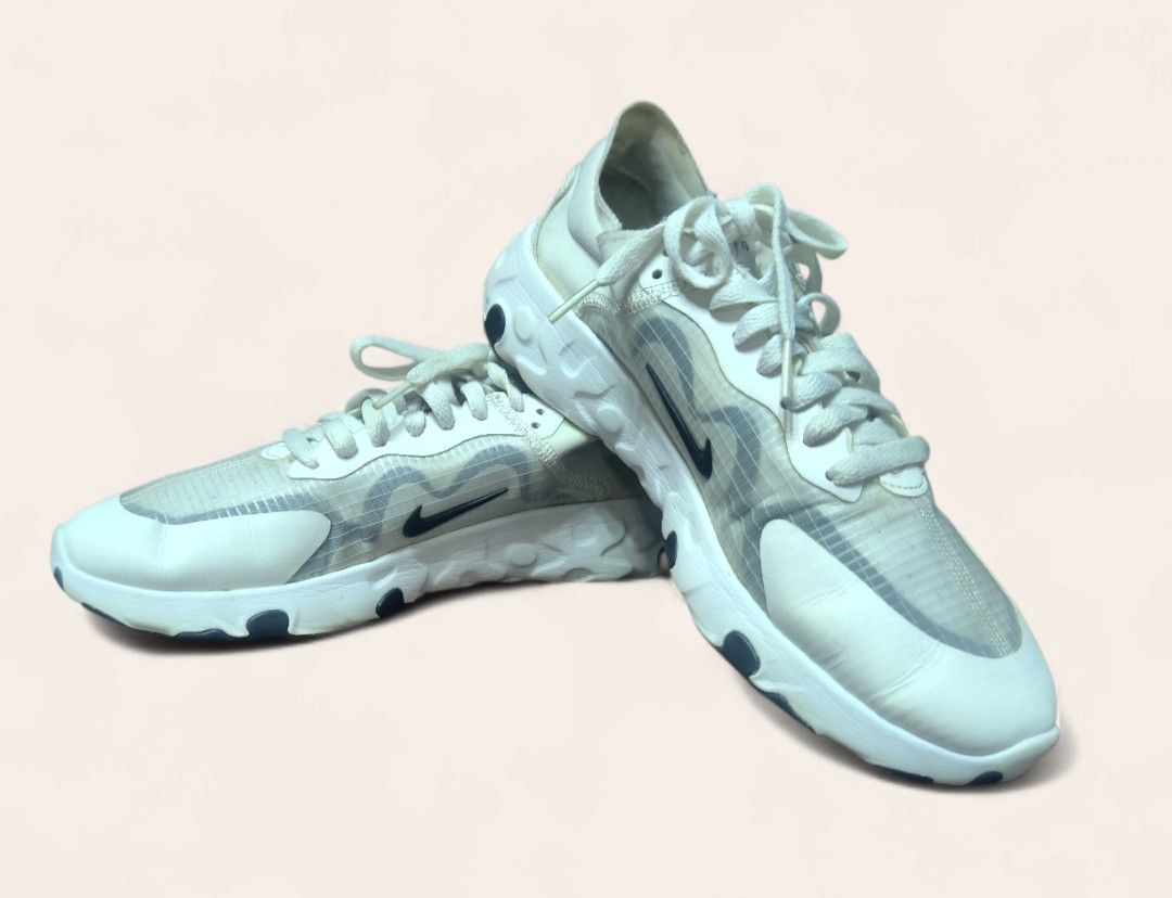 Authentic Nike React Renew Lucent Element 55 White Sneakers Us 9 (Category: Sneakers) located in Davao. Submitted by angel_924 (Listing ID 1413545115, Image 2). Description: White Nike React Element 55 sneakers. Features a white and translucent upper with a dark blue Nike swoosh. The sole is white with dark blue accents. The shoes have white laces and a React foam midsole..