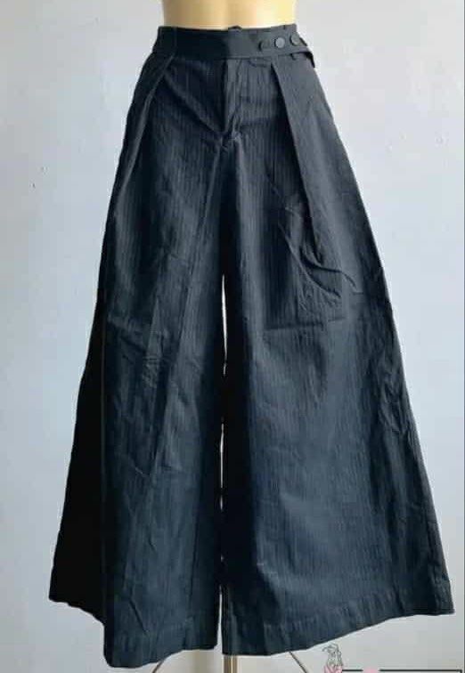 Black Wide Leg Pants (Category: Other Bottoms) located in Las Pinas. Submitted by tickya (Listing ID 1413489829, Image 1). Description: - Black wide-leg pants - Relaxed fit for comfort - Subtle vertical stripe pattern - Suitable for casual and semi-formal occasions.