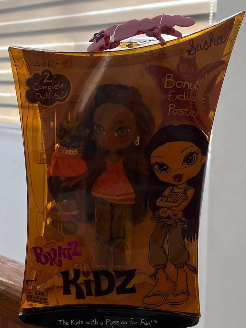Bratz Kidz Sasha Doll (Category: Kids Toys) located in Balanga. Submitted by moiramiu (Listing ID 1413572604, Image 1). Description: - Bratz Kidz Sasha doll - Original packaging - Complete outfits got this when i was a kid and never really took her out of the box! it got stuck in storage and hasnt been opened since. please manage expectations, it smells and looks old also i based the pricing off of fb and other sites lang din! feel free to offer,