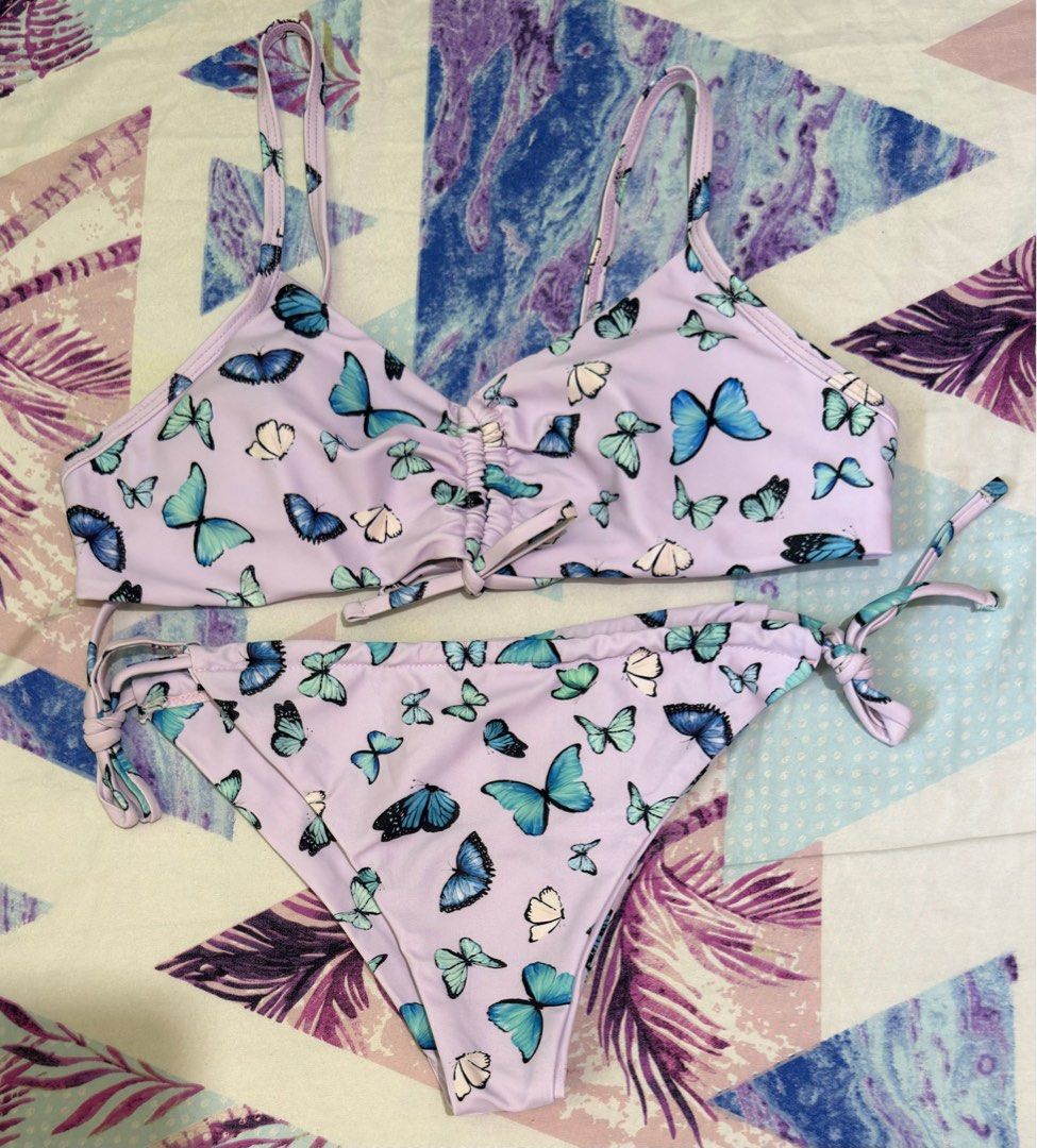 BUTTERFLY TWO PIECE SWIMWEAR (Category: Bikinis & Swimsuits) located in Quezon City. Submitted by lovedbysari (Listing ID 1413508104, Image 1). Description: BRAND NEW! 💯 •Size: Large •Small padded •Super pretty with butterfly prints 😍 •Actual photos are posted •Feel free to message me ☺️.