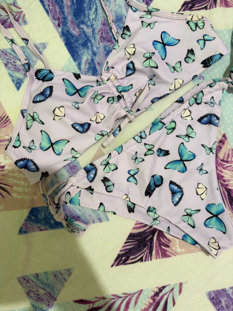 BUTTERFLY TWO PIECE SWIMWEAR (Category: Bikinis & Swimsuits) located in Quezon City. Submitted by lovedbysari (Listing ID 1413508104, Image 2). Description: BRAND NEW! 💯 •Size: Large •Small padded •Super pretty with butterfly prints 😍 •Actual photos are posted •Feel free to message me ☺️.