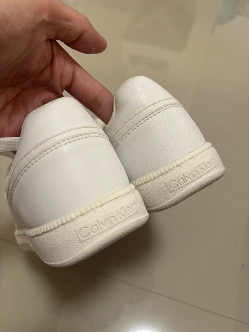 Calvin Klein White Sneakers from US (Category: Sneakers) located in Meycauayan. Submitted by retroselectionph (Listing ID 1413571555, Image 3). Description: - White Calvin Klein sneakers - Brand new, unused - nakatabi lang sa lagayan - size 8.5 1k php.