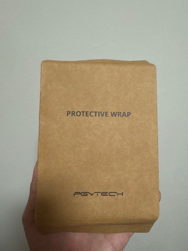 Camera Protective Wrap/Cover (Category: Other Photography Accessories) located in Singapore. Submitted by _weiyang (Listing ID 1413628310, Image 3). Description: PGYTECH Folding Photography Camera Protective Wrap Camera Cloth Protective Cover FEATURES: 1. The fabric is made of polymer material and processed with nano-technology, and has great bonding force that won’t be compromised after wash. 2. It can be form-fitted safely around cameras, lense