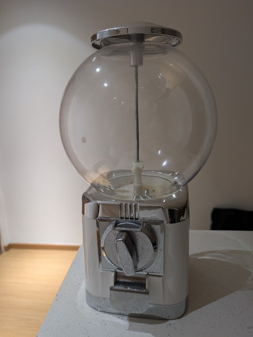 Capsules machine (Category: Coffee Machines & Makers) located in Singapore. Submitted by cyclone (Listing ID 1413589749, Image 1). Description: used for Nespresso capsules good for pantry solid metal base no coin required. can randomise your coffee choices able to put in about 80 capsules.