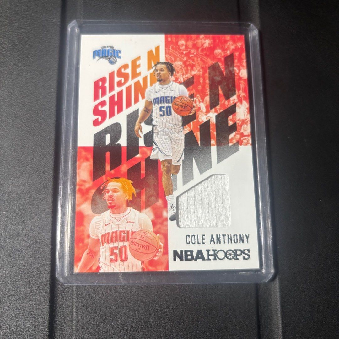 Cole Anthony NBA Card GU Hoops RC (Category: Raw Singles) located in Pasig City. Submitted by dr1zzy (Listing ID 1413624061, Image 1). Description: - Cole Anthony NBA Hoops Rise N Shine trading card - Features Cole Anthony in Orlando Magic uniform - Card is in a protective sleeve.