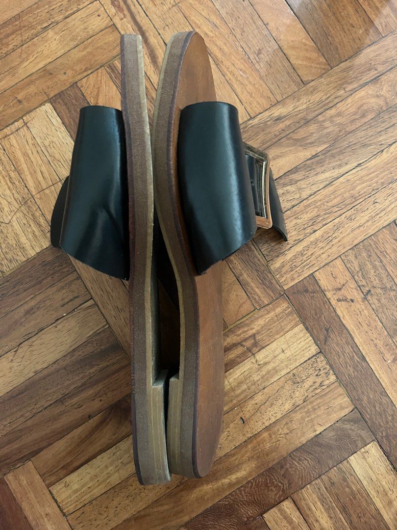 Cole Vintage Leather Sandals (Category: Flats & Sandals) located in Paranaque City. Submitted by superpeanut (Listing ID 1413498344, Image 2). Description: - Cole J. sandals - Black leather straps with gold buckles - Brown leather footbed - Perfect for casual wear - Comfortable and easy to slip on.