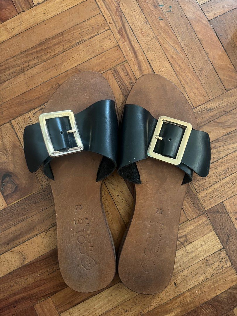 Cole Vintage Leather Sandals (Category: Flats & Sandals) located in Paranaque City. Submitted by superpeanut (Listing ID 1413498344, Image 1). Description: - Cole J. sandals - Black leather straps with gold buckles - Brown leather footbed - Perfect for casual wear - Comfortable and easy to slip on.