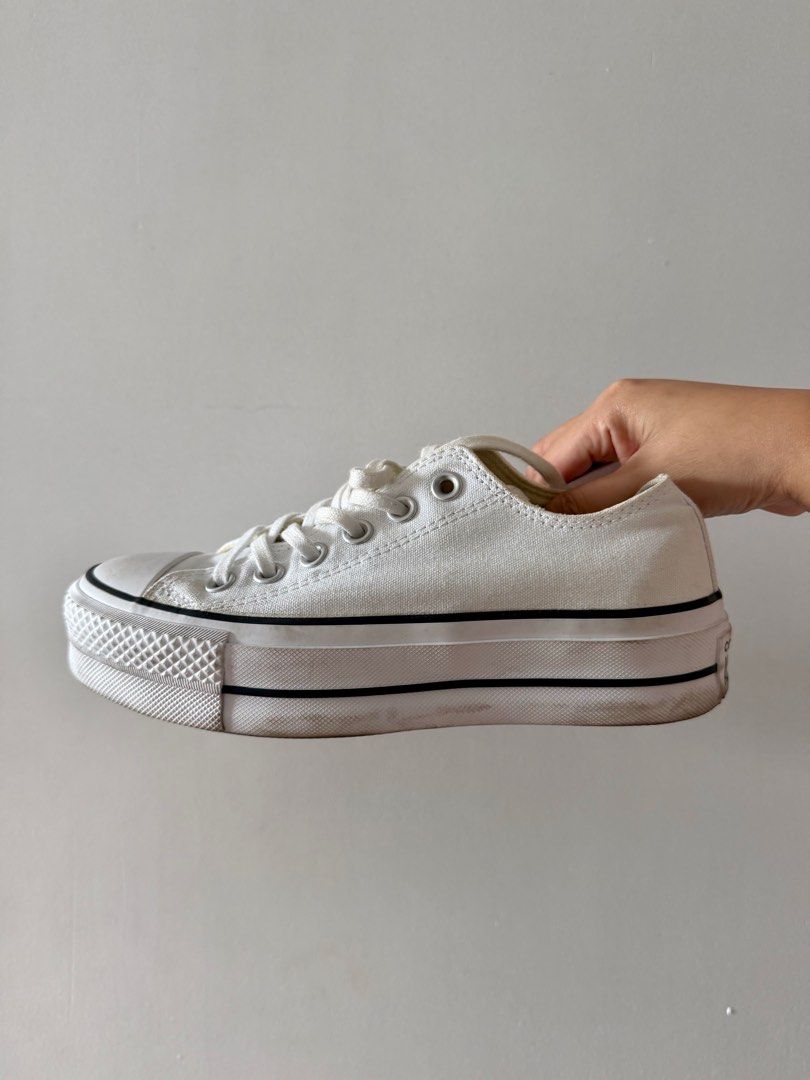 Converse Chuck Taylor All Star Lift (Category: Sneakers) located in Manila. Submitted by fdvilla (Listing ID 1413454736, Image 2). Description: White Converse Chuck Taylor All Star Lift platform sneakers in Classic white colorway. Features white laces, eyelets, and sole with black stripe and Visible Converse logo. Preloved, in good condition with some signs of normal use. Selling as I am decluttering..