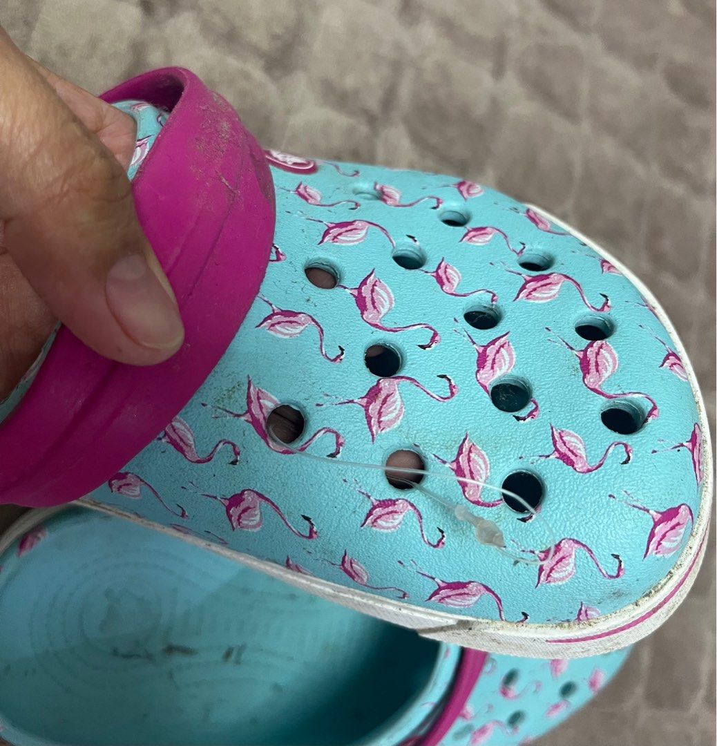 Crocs Flamingo Print Clogs (Category: Slippers and slides) located in Paranaque City. Submitted by princessann0721 (Listing ID 1413614382, Image 3). Description: - Flamingo print Crocs clogs - Light blue base - Pink strap - White sole - size J3 - Comfortable for everyday wear - May tag pa/ puro alikabok lang / 1-2 times lang nagamit / no time to wash na😥.
