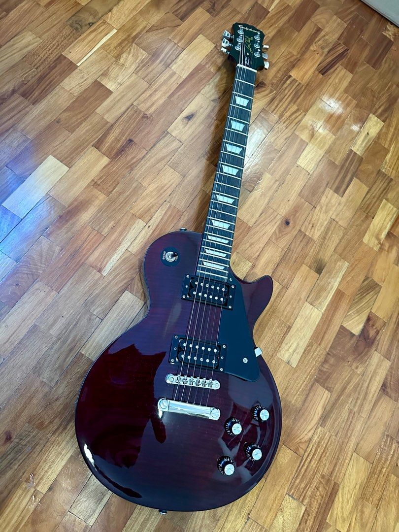 Epiphone Les Paul Classic (Category: Musical Instruments) located in Manila. Submitted by rc103 (Listing ID 1413556427, Image 1). Description: Great Condition 9/10 Pwede sa maselan Swabe ang tunog No dents All working Original Classic - T but replaced with original Grover Tuners (non auto) Only used indoor as a hobby Minimal hairline usage scratches No swap No meetup Pickup only at our place. Filinvest East Cainta Rizal Schedule in advance Free p
