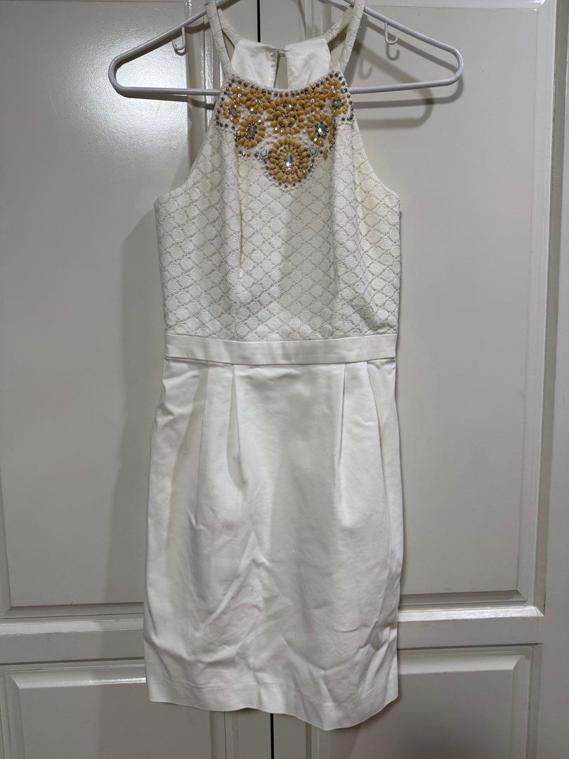 Ever New White Embellished Dress (Category: Dresses) located in Manila. Submitted by maag16 (Listing ID 1413625730, Image 1). Description: - Ever New white dress - Halter neckline with bead embellishments - Textured bodice - Pleated skirt - Side zipper closure - Size: AUS 6 / EUR 34 / US 2 - L from shoulder to end taken from front: 25 in - Made in China.