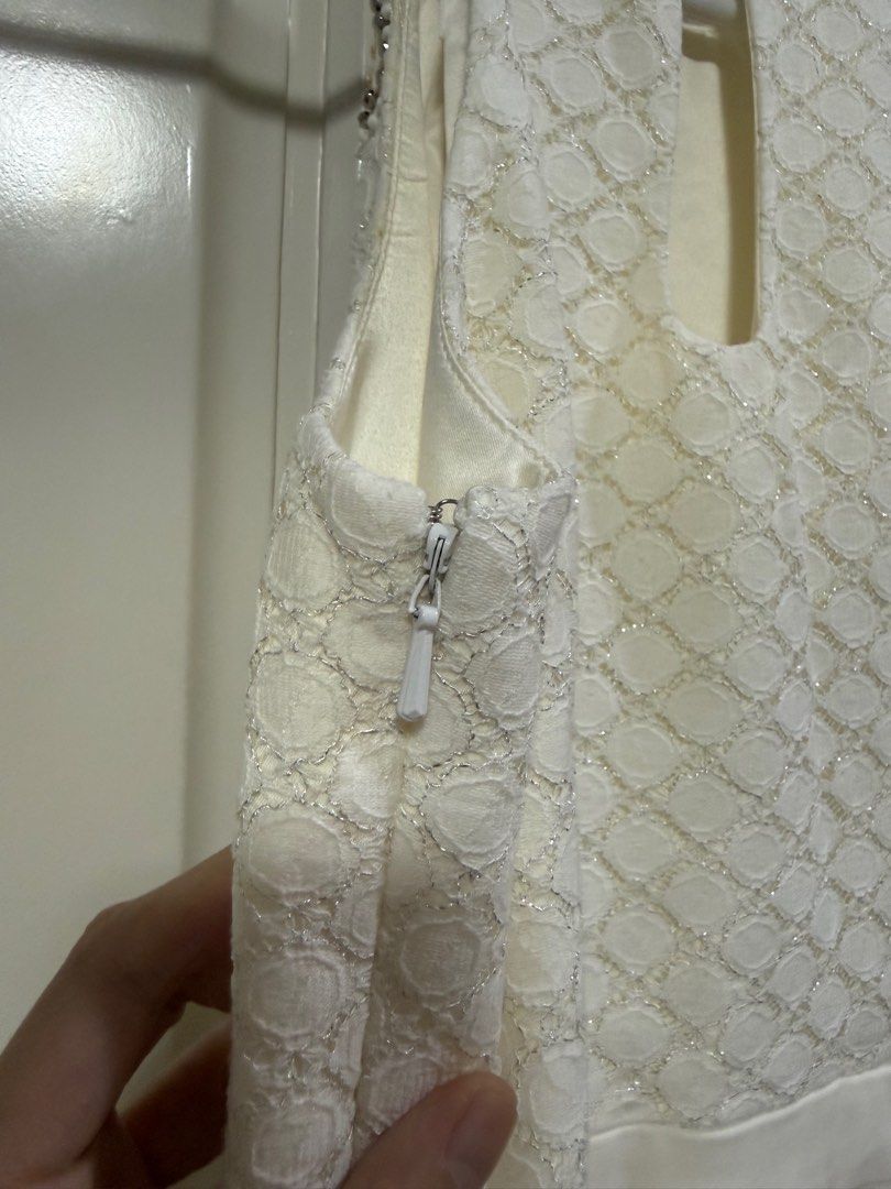 Ever New White Embellished Dress (Category: Dresses) located in Manila. Submitted by maag16 (Listing ID 1413625730, Image 3). Description: - Ever New white dress - Halter neckline with bead embellishments - Textured bodice - Pleated skirt - Side zipper closure - Size: AUS 6 / EUR 34 / US 2 - L from shoulder to end taken from front: 25 in - Made in China.