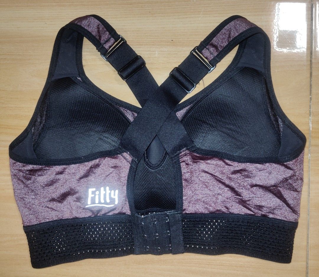 Fitty sports Padded bra (Category: Activewear) located in Kabankalan. Submitted by stylesavy (Listing ID 1413591872, Image 3). Description: - Fitty sports bra - Size: M - Condition: Excellent - Design: Criss-cross back - Features: Mesh detailing for breathability - Color: Purple and black - Supportive and comfortable.