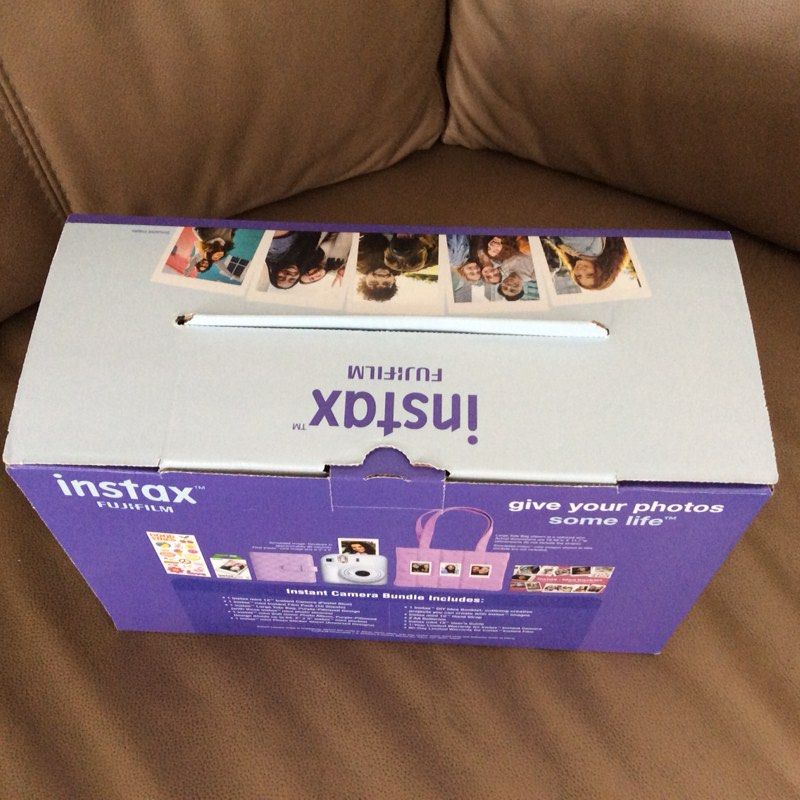 Fujifilm Instax Mini 12 Instant Camera Bundle (Category: Cameras) located in Taguig. Submitted by francisco_7 (Listing ID 1413559703, Image 3). Description: - Fujifilm Instax Mini 12 Instant Camera Bundle - Includes: Camera, Photo Album, Stickers, and Tote Bag - Features automatic exposure and flash control - Easy to use for everyone - Allows for close-up shots - Stylish design - Bring your photos to life!.