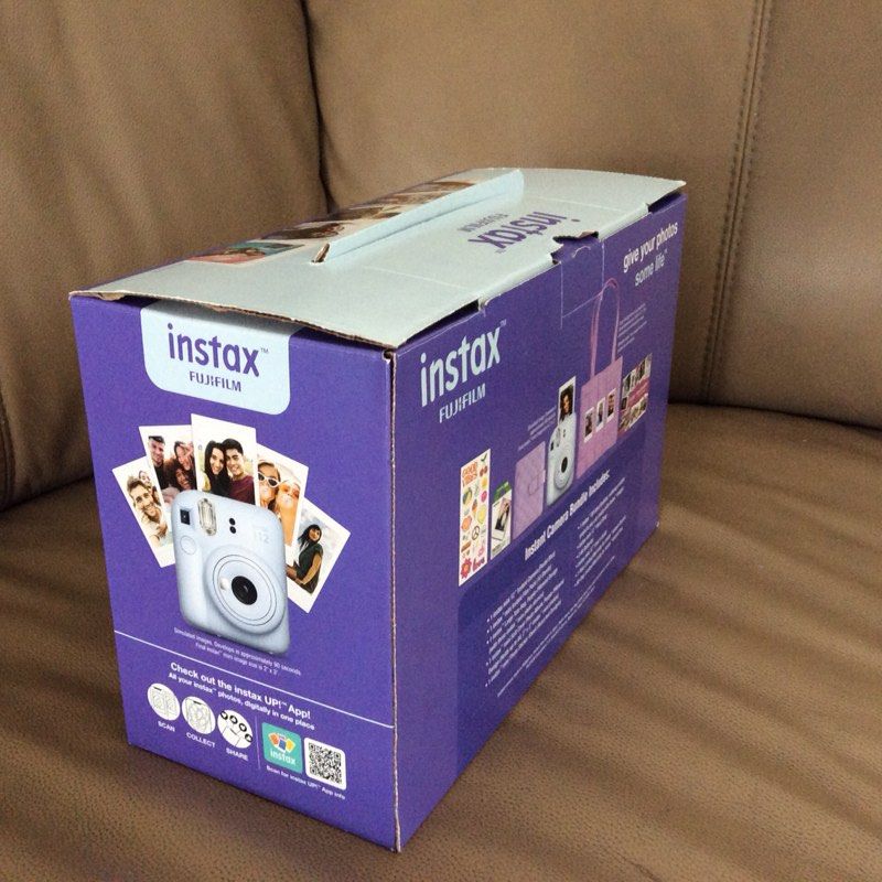 Fujifilm Instax Mini 12 Instant Camera Bundle (Category: Cameras) located in Taguig. Submitted by francisco_7 (Listing ID 1413559703, Image 2). Description: - Fujifilm Instax Mini 12 Instant Camera Bundle - Includes: Camera, Photo Album, Stickers, and Tote Bag - Features automatic exposure and flash control - Easy to use for everyone - Allows for close-up shots - Stylish design - Bring your photos to life!.