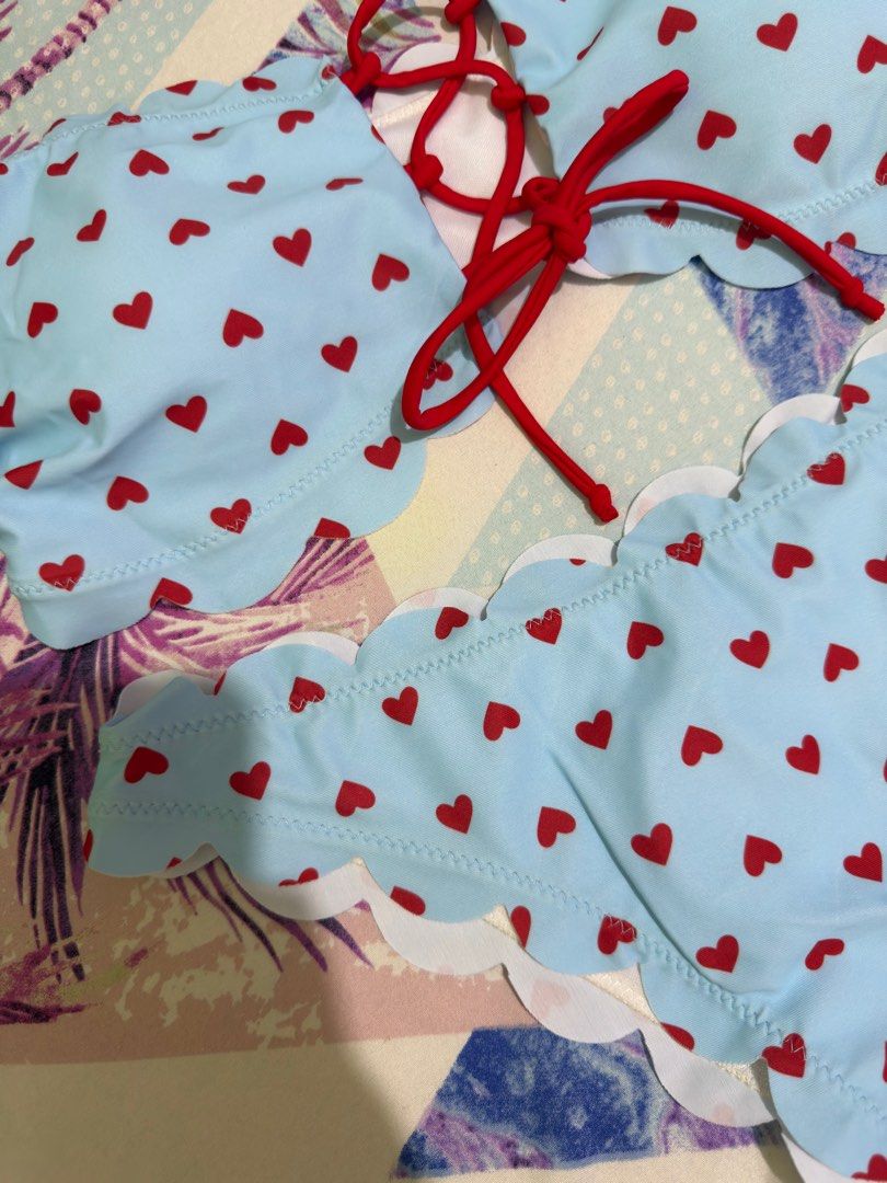 HEART TWO PIECE SWIMWEAR (Category: Bikinis & Swimsuits) located in Quezon City. Submitted by lovedbysari (Listing ID 1413504406, Image 2). Description: BRAND NEW! 💯 •Size: XL •Padded •Super pretty with heart prints 😍 •Actual photos are posted •Feel free to message me ☺️.