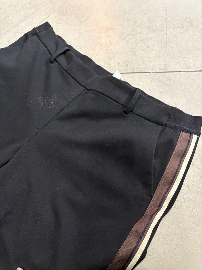 H&M Black Trousers with Side Stripe (Category: Other Bottoms) located in Paranaque City. Submitted by caityprecky (Listing ID 1413493059, Image 2). Description: - H&M black trousers - Side stripe detail - Straight leg cut - Size: EUR 44, UK 16, CN 175/84A - Features front pockets and elastic waistband.