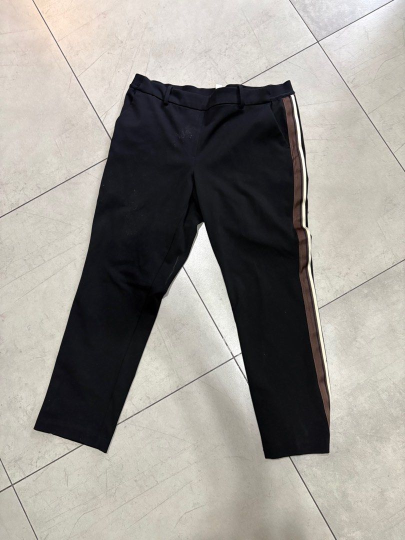H&M Black Trousers with Side Stripe (Category: Other Bottoms) located in Paranaque City. Submitted by caityprecky (Listing ID 1413493059, Image 1). Description: - H&M black trousers - Side stripe detail - Straight leg cut - Size: EUR 44, UK 16, CN 175/84A - Features front pockets and elastic waistband.