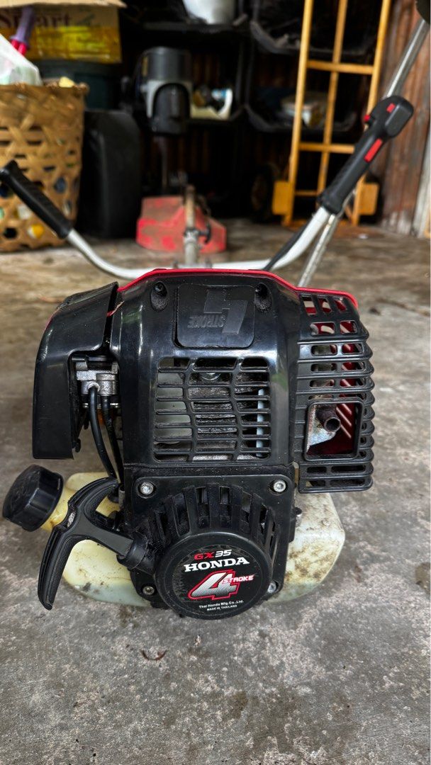 Honda GX35 4-Stroke Brush Cutter (Category: Grass Mowers & Trimmers) located in Zamboanguita. Submitted by andreysavin (Listing ID 1413435764, Image 3). Description: hand-held lawn mower trimmer Made in China. It need to clean carburetor Does not stable work as for now .