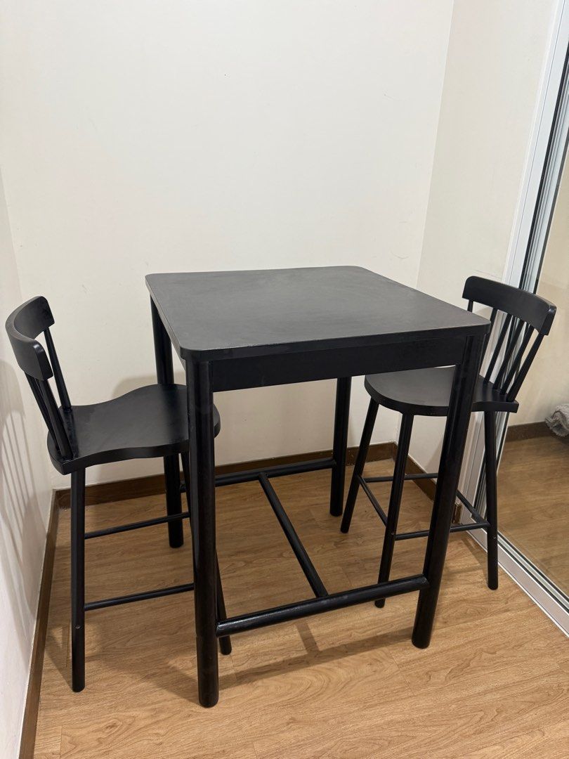 Ikea Black Square Table with Two Stools (Category: Tables & Sets) located in Antipolo. Submitted by jb_declutter (Listing ID 1413459673, Image 1). Description: Dining set from IKEA. Originally bought for 25k, now selling for only 3k. Issues: There are small paint peelings and there are white spots on the table top. Note: We have disassembled the table to save space. The set can still be restored the only issue is the paint..