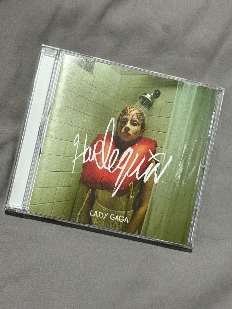 Lady Gaga - Harlequin CD (Category: CDs & DVDs) located in Zamboanga. Submitted by crysmelquin (Listing ID 1413644608, Image 1). Description: - Lady Gaga's "Harlequin" album CD. - Features the original album cover design. - Comes in its original case. - Ideal for Lady Gaga fans and music collectors..