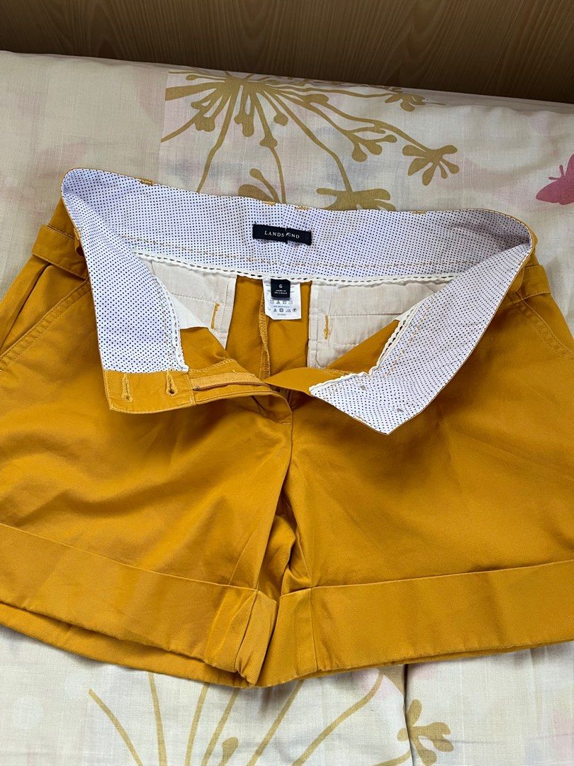 Landsend Mustard Yellow Shorts (Category: Shorts) located in Pasig City. Submitted by gjoconcepcion (Listing ID 1413520844, Image 2). Description: - Landsend mustard yellow shorts - Button and zipper closure - Two front and two back pockets - Folded hem detail - Patterned waistband lining - Tailored fit - Classic design - Ideal for casual wear.