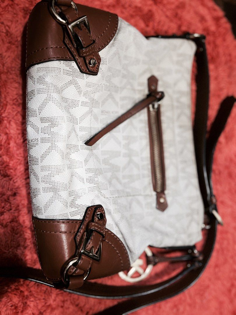 Limited, AuthenticMichael Kors Med messenger Bag (Category: Luxury Bags & Wallets) located in Quezon City. Submitted by sherashley (Listing ID 1412221917, Image 3). Description: PRODUCT DETAILS Brand: Michael Kors Model: FALLON Exterior Color: cream w/combination or brown leather Size: Medium Bag Width: 11 inches Department: Women Style: Messenger / Shoulder Bag Bag Height: 9 inches Product Line: Michael Kors Fallon Pattern: MK Monogram Features:
