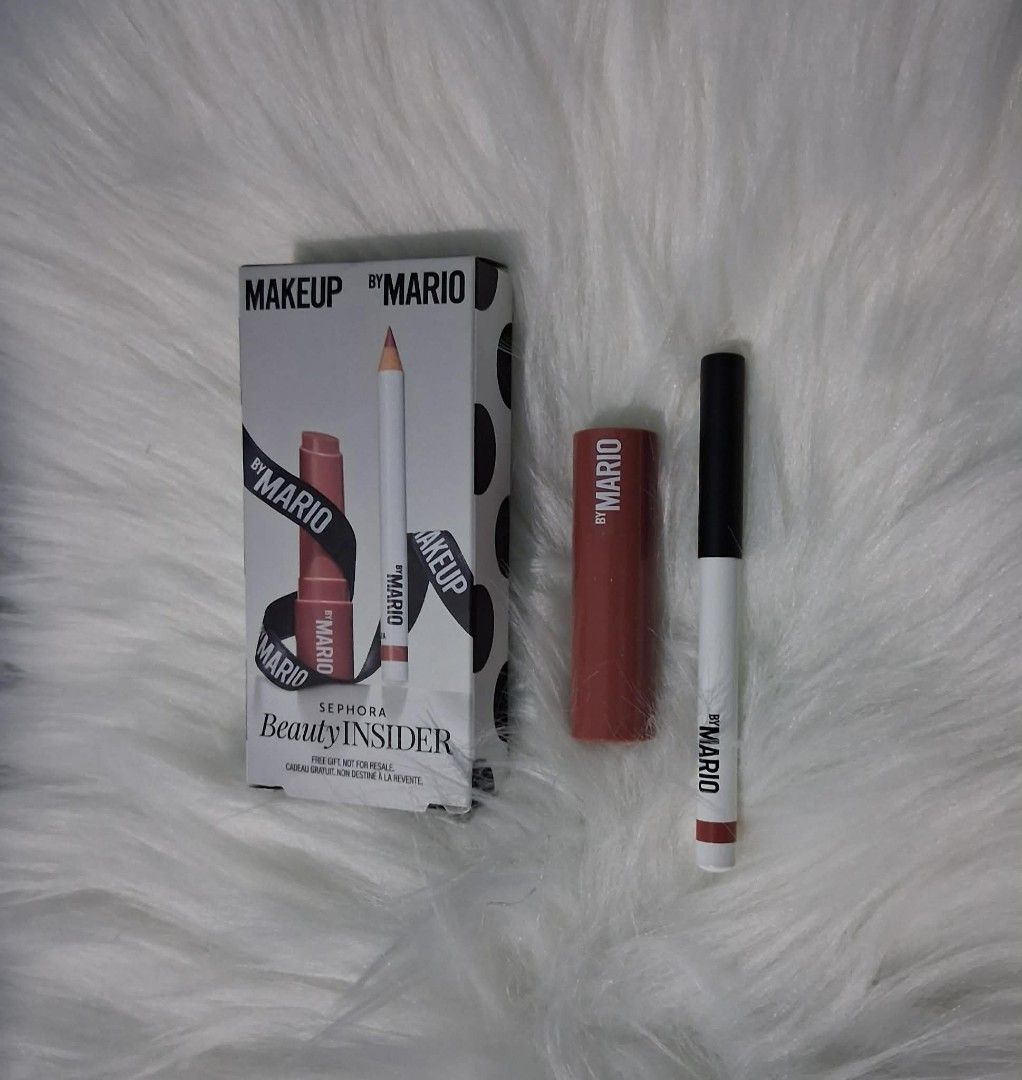 Makeup by Mario Lipstick and Lip Liner Set (Category: Makeup) located in Imus. Submitted by jen.rillo (Listing ID 1413611177, Image 1). Description: - Makeup by Mario Lipstick & Lip Liner Set - Lipstick Shade: Reddish-brown - Lip Liner: White with reddish-brown tip - Includes original packaging - Brand name 'MARIO' visible on both products.