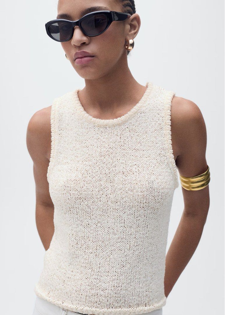 Mango crochet knit high neck tank top thick straps (Category: Sleeveless) located in Cavite. Submitted by bg0407 (Listing ID 1413625575, Image 1). Description: Crochet fabric. Cotton blend fabric. Round neck. Wide straps. Sleeveless. - 10/10 condition - very breathable crochet knit material - thick sleeves / straps - perfect for the beach and tropical weather - perfect basic Helping tags: Princess Polly, Glassons, Peppermayo, Tiger Mist, Meshki, 