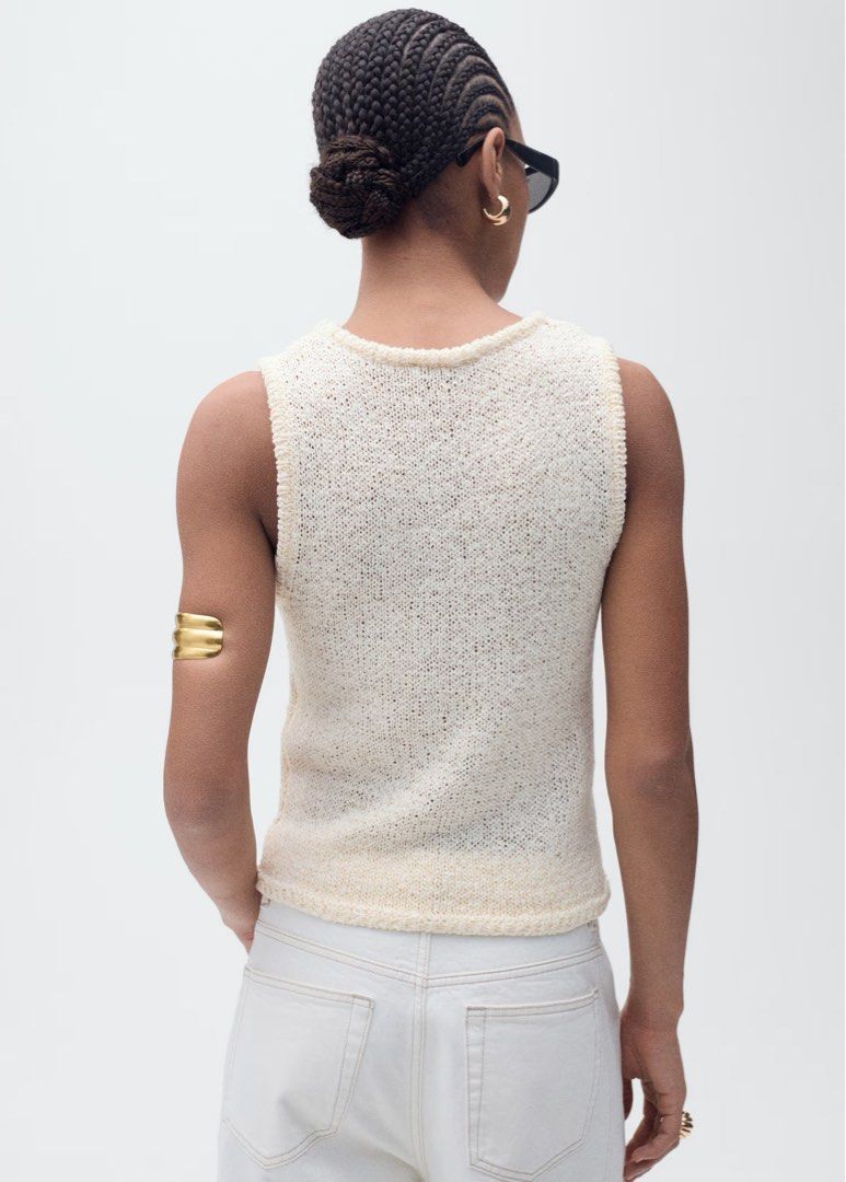 Mango crochet knit high neck tank top thick straps (Category: Sleeveless) located in Cavite. Submitted by bg0407 (Listing ID 1413625575, Image 3). Description: Crochet fabric. Cotton blend fabric. Round neck. Wide straps. Sleeveless. - 10/10 condition - very breathable crochet knit material - thick sleeves / straps - perfect for the beach and tropical weather - perfect basic Helping tags: Princess Polly, Glassons, Peppermayo, Tiger Mist, Meshki, 