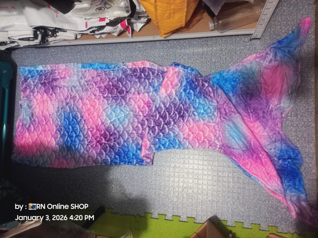 Mermaid Tail - Colorful (Category: Looking For) located in Caloocan City. Submitted by rb_17 (Listing ID 1413437708, Image 2). Description: - Vibrant mermaid tail design - Measures 54-55 inches long - 19 inches wide - Features a scale pattern and fin - Great for swimming or costumes.