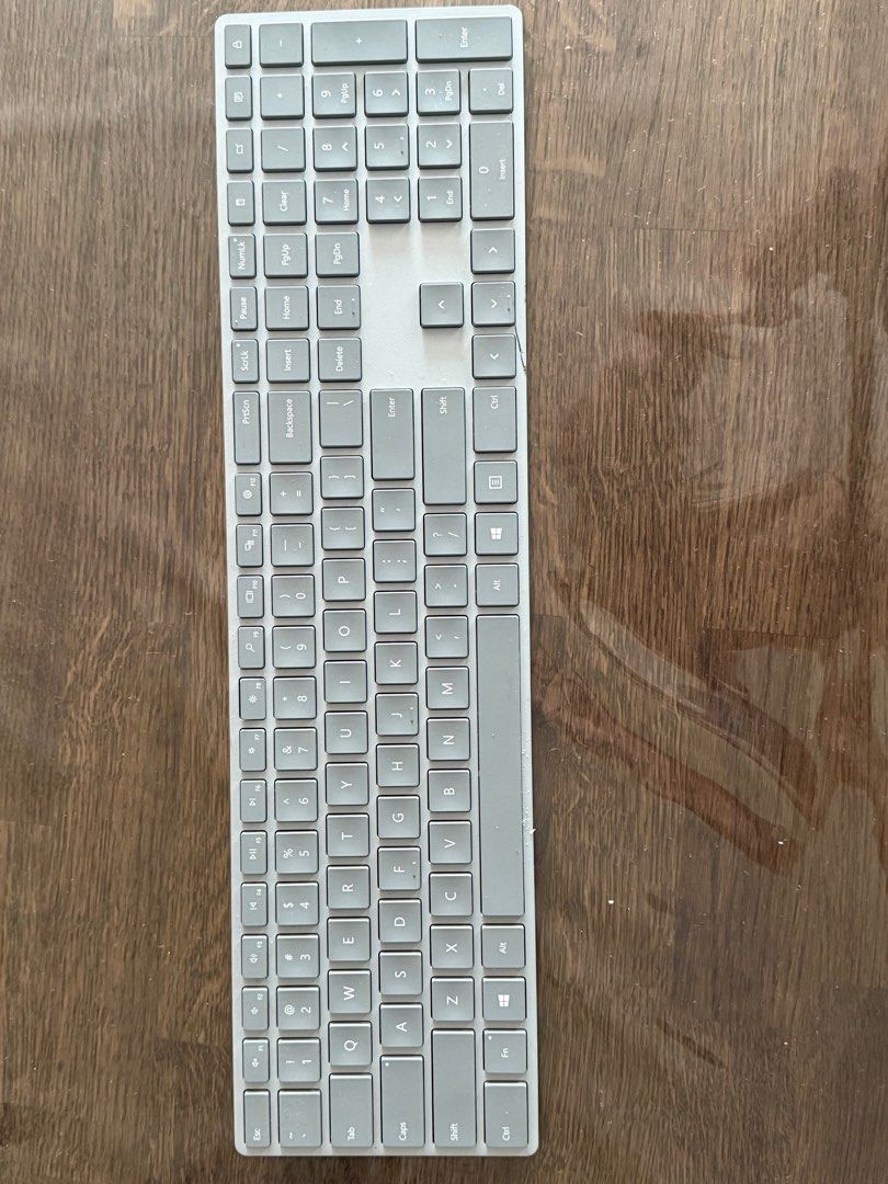 Microsoft Surface Keyboard - Silver (Category: Computer Keyboard) located in Singapore. Submitted by joshiboshi (Listing ID 1413569607, Image 1). Description: - Silver Microsoft Surface keyboard - Wireless - Includes full number pad - Ideal for everyday use.