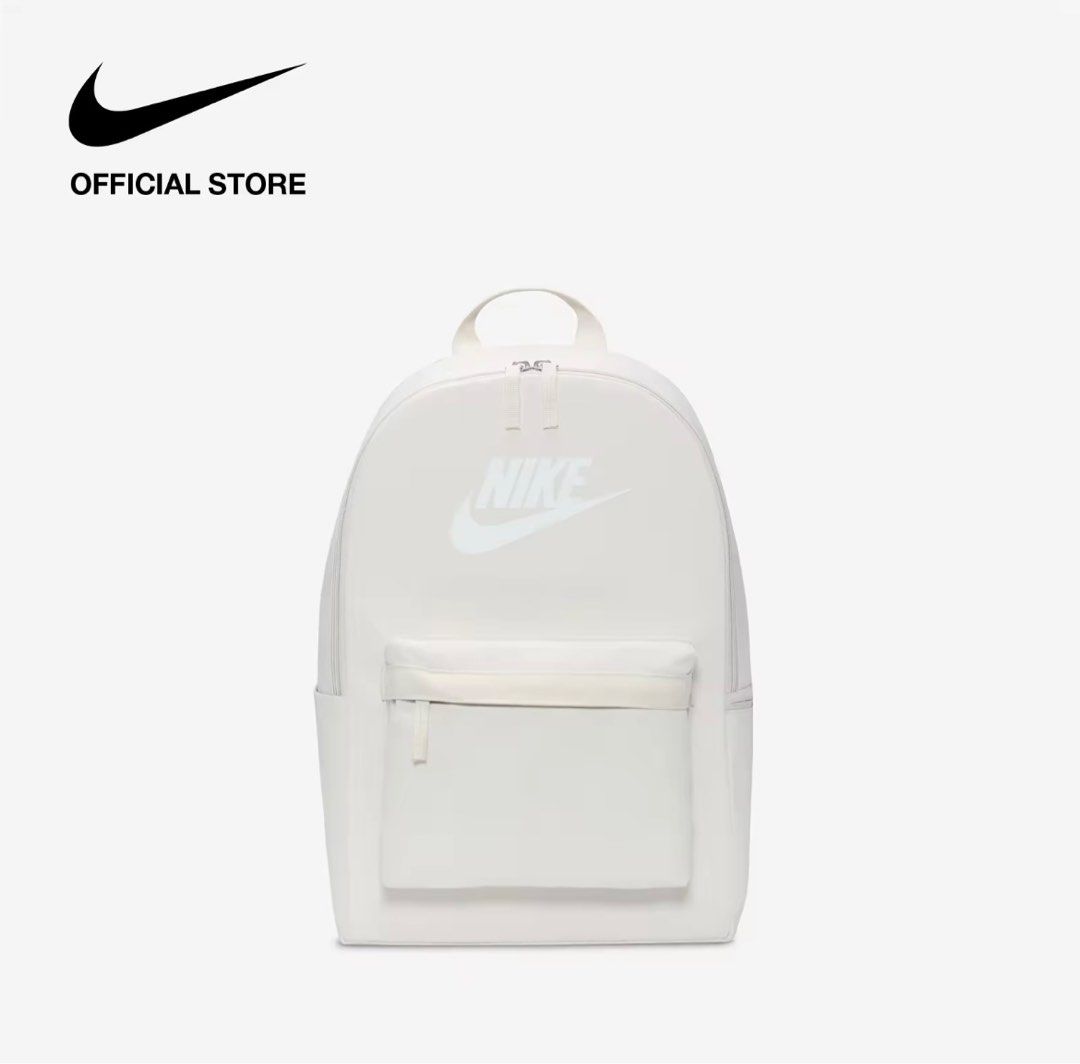 Nike Heritage Backpack (25L) - Light Orewood Brown (Category: Backpacks) located in Quezon City. Submitted by ammp15 (Listing ID 1413643518, Image 1). Description: - Nike Heritage Backpack - Spacious main compartment - Front pocket for easy access - Padded back panel for comfort - Adjustable shoulder straps - Top handle for carrying - Secure zipper closure - Nike logo prominently displayed.