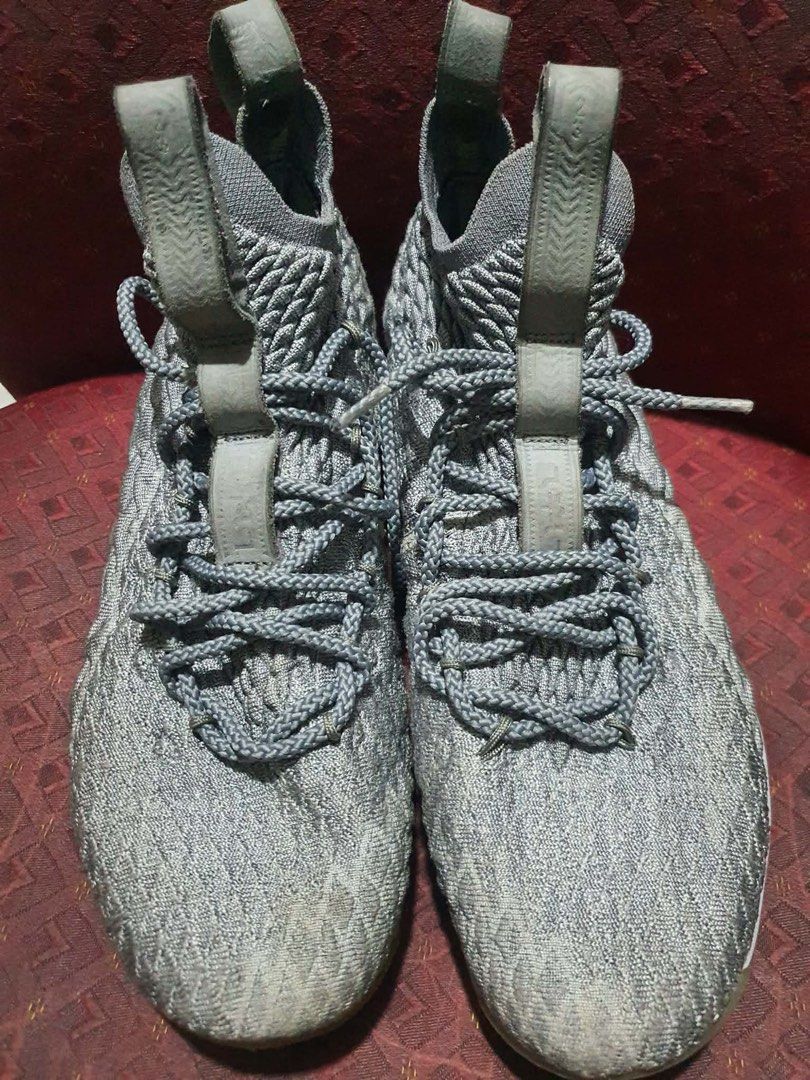 Nike LeBron 15 Grey Basketball Shoes (Category: Sneakers) located in Quezon City. Submitted by piatot (Listing ID 1413602000, Image 3). Description: - Authentic Nike LeBron 15 basketball shoes - Size: US 7Y, UK 6, EUR 40, 25 cm - Color: Grey - Features: Woven upper, lace-up closure, Air Max unit - Made in China - Includes POIZON authentication.