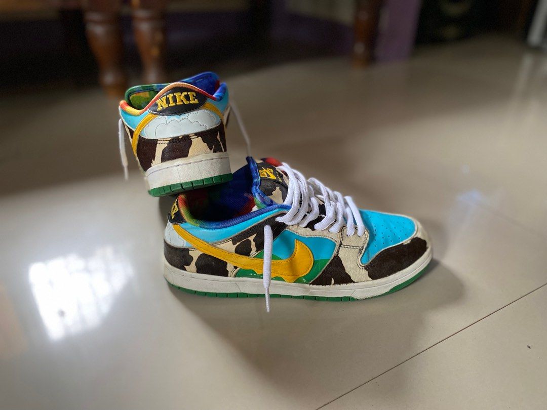 Nike SB Dunk Low Ben & Jerry's Chunky Dunky (Category: Sneakers) located in Iloilo. Submitted by maryne (Listing ID 1413497762, Image 2). Description: - Nike SB Dunk Low Ben & Jerry's Chunky Dunky sneakers - Features: - Blue sky upper - Cow print overlays - Yellow swoosh - Green sole - Colorful tongue design - Includes white laces.