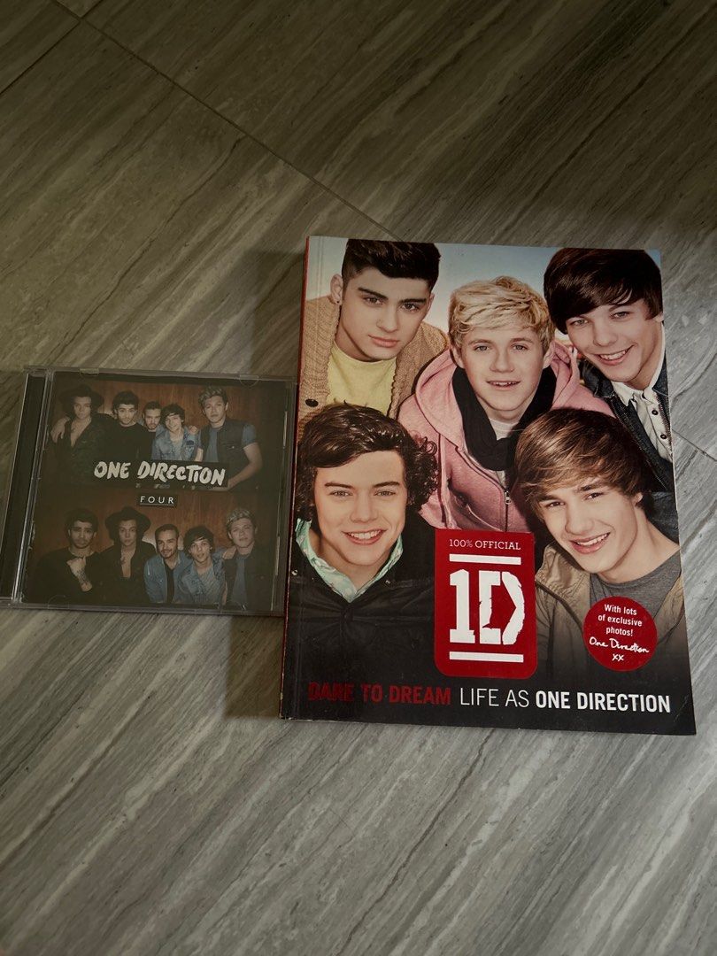 One Direction Book and CD (Category: CDs & DVDs) located in Quezon City. Submitted by randrshopping (Listing ID 1413504113, Image 1). Description: - "Dare to Dream: Life as One Direction" book included. - Features photos of the band members. - "Four" CD album also included. - CD is in its original case. - Ideal for One Direction fans..