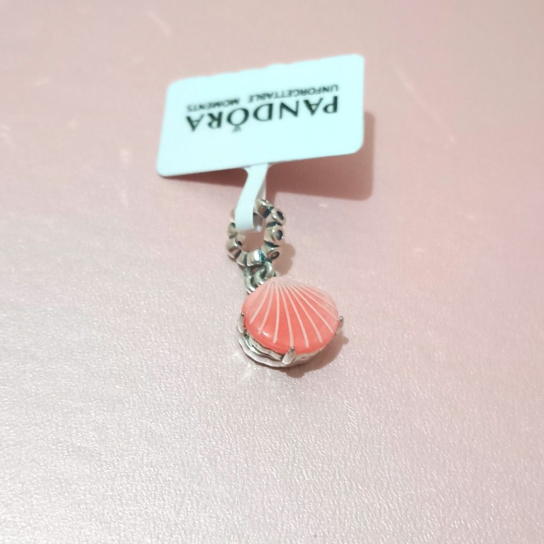 Pandora Coral-colored Shell Double Dangle Charm (Category: Charms) located in Santa Rosa. Submitted by love.jewels (Listing ID 1413619131, Image 2). Description: ALL ITEMS ARE NEGOTIABLE, YOU ARE FREE TO MAKE AN OFFER, I. WILL GIVE YOU THE BEST PRICE 😍 ALL BRANDNEW NOT PRELOVED NOT SECOND-HAND FROM FACTORY FOR BRACELET 16-21 CM AVAILABLE SIZES FOR RING 5-10 AVAILABLE SIZE.