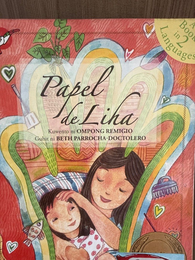 Papel de Liha - Children's Book (Category: Children's Books) located in Quezon City. Submitted by timoshop (Listing ID 1413481832, Image 1). Description: - Title: Papel de Liha - Author: Ompong Remigio - Illustrator: Beth Parrocha-Doctolero - Genre: Children's Book - Language: Bilingual - Cover: Features a mother and child illustration.