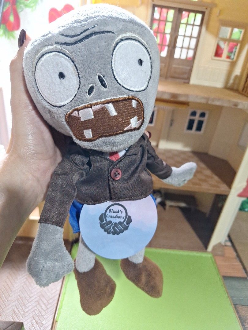 Plants vs. Zombies Zombie Plush Toy (Category: Plushies & Soft Toys) located in Cavite. Submitted by Mavee (Listing ID 1413591442, Image 2). Description: Hard to find plant's vs. zombies plush doll, may panabit, cute na katakut hahaha, ayaw nila mama' pls. adopt him na wawa naman 💚ang ganda pa walang punit, cleaned na already nahuhubad shorts pede i wash😊.
