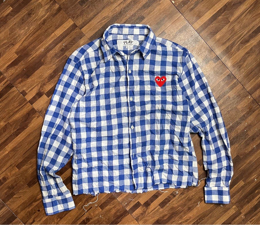 Play Comme des Garcons Checkered Button Down Polo (Category: Longsleeves) located in Cabanatuan. Submitted by refind-ph (Listing ID 1413544280, Image 1). Description: Play Comme des Garcons Checkered Button Down Polo Dimes 19 x 22 inches Very good condition Issue ripped hem part Color rate 9/10 Dm to purchase! 📩.
