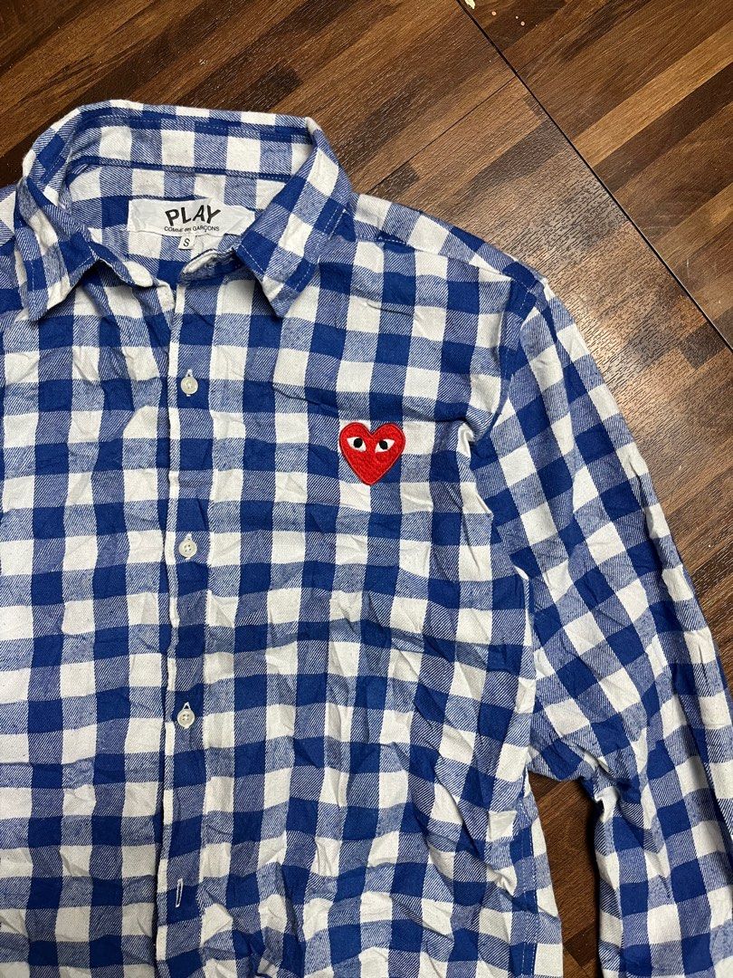 Play Comme des Garcons Checkered Button Down Polo (Category: Longsleeves) located in Cabanatuan. Submitted by refind-ph (Listing ID 1413544280, Image 2). Description: Play Comme des Garcons Checkered Button Down Polo Dimes 19 x 22 inches Very good condition Issue ripped hem part Color rate 9/10 Dm to purchase! 📩.
