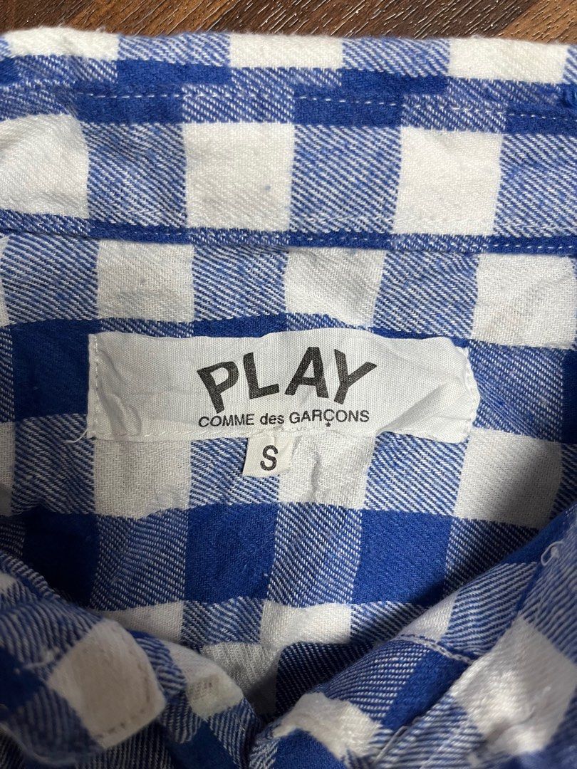 Play Comme des Garcons Checkered Button Down Polo (Category: Longsleeves) located in Cabanatuan. Submitted by refind-ph (Listing ID 1413544280, Image 3). Description: Play Comme des Garcons Checkered Button Down Polo Dimes 19 x 22 inches Very good condition Issue ripped hem part Color rate 9/10 Dm to purchase! 📩.
