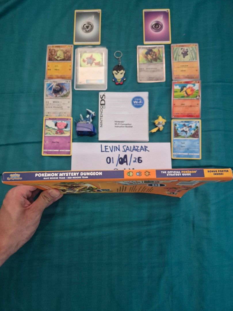 POKEMON MYSTERY DUNGEON STRATEGY GUIDE SET (Category: Nintendo) located in Guiguinto. Submitted by Levinthings (Listing ID 1413555887, Image 3). Description: For Sale: (as SET/BUNDLE) > Inclusions: - Nintendo Pokemon Mystery Dungeon Official Strategy Guide (Red/Blue Rescue Team) - Nintendo DS Wifi Booklet - Pokemon TCG Rotom Dex 015/SM-P (Jp) - random Eng/Jp cards - Pokemon figures - Keychain *FREE: -Sleeve -Toploader > Price: 2400 > Condition: W