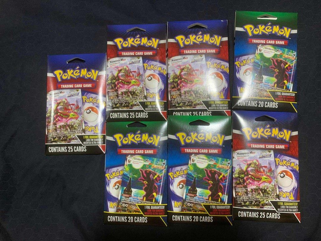 Pokemon Trading Card Game Packs (Category: Card Packs) located in Cavite. Submitted by lmd11 (Listing ID 1413571631, Image 1). Description: Just arrived from the US - Pokemon Trading Card Game packs available! -₱550 each - Packs contain 20-25 cards. - Each pack includes 1 guaranteed foil card. - Featuring Rayquaza V and Umbreon V cards. - Perfect for both collectors and players! - Expand your collection today!.