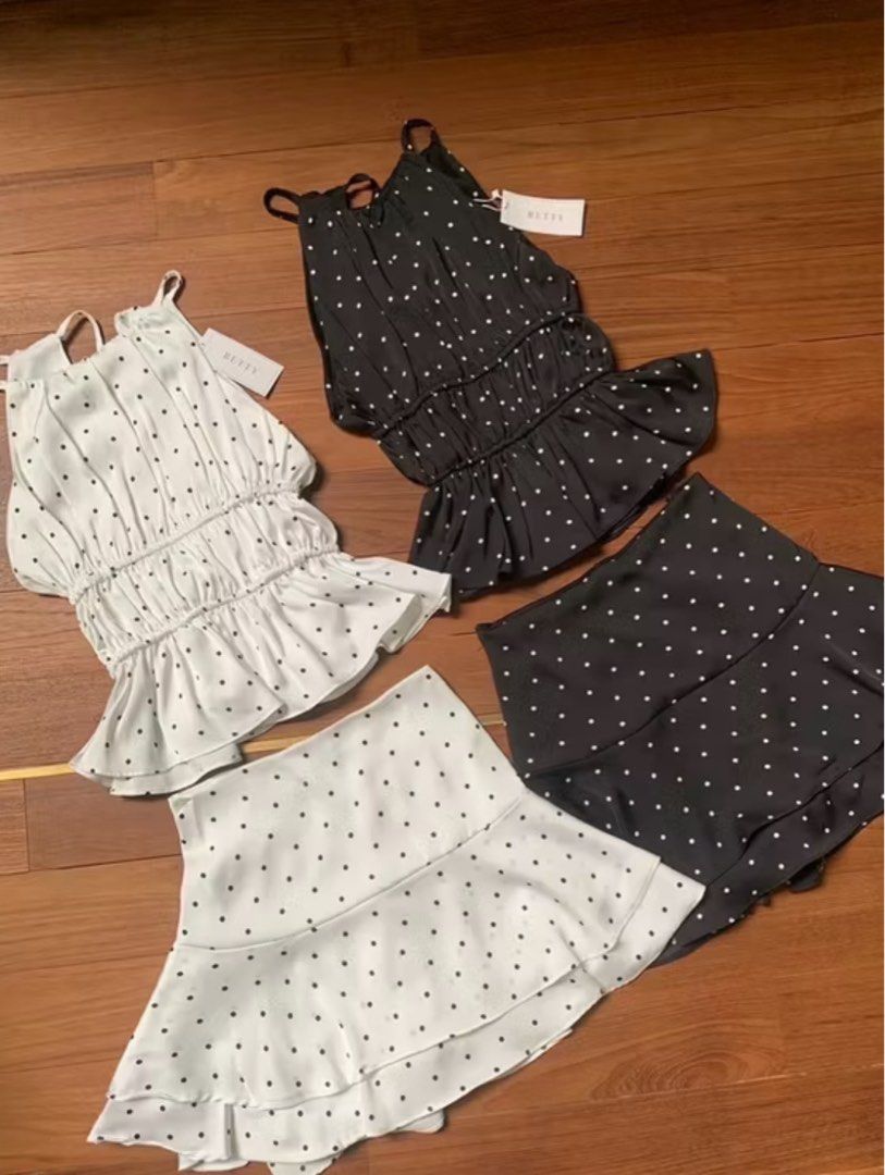 Polka Dots Top and Ruffle Skirt Set (Category: Sets or Coordinates) located in Cebu City. Submitted by shayneallo (Listing ID 1413487392, Image 3). Description: First three pictures are not mine, ctto From Thailand Skirt has a built in shorts Free size ( small to medium-large) Top is a halter neck with tie at the back Skirt is garterized at the back.