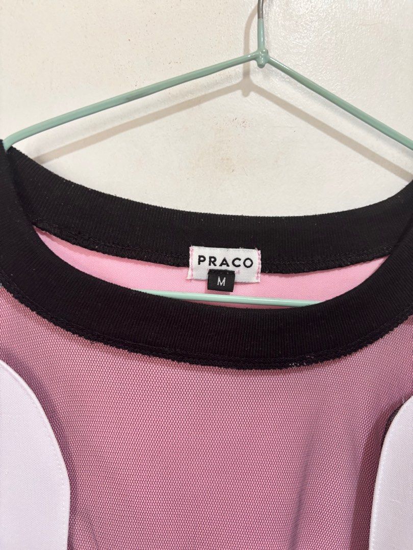 Praco Pink Mesh Panel T-shirt - Size M (Category: Tshirts & Polo Shirts ) located in Quezon City. Submitted by tonicartz (Listing ID 1413510532, Image 2). Description: - Praco T-shirt - Size: M - Design: Pink body, black collar, mesh paneling - Sleeves: Short - Neckline: Crew neck - Back: Solid pink - Condition: Good.