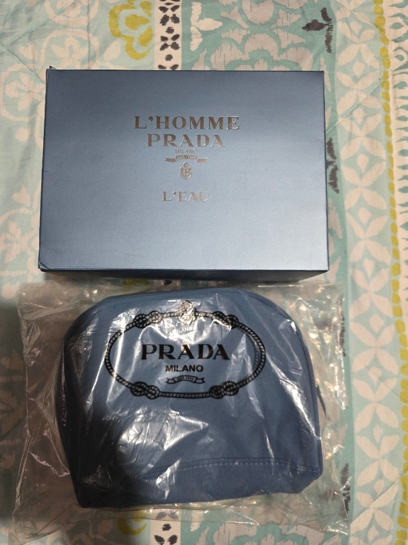 Prada pouch (Category: Luxury Bags & Wallets) located in Las Pinas. Submitted by luxeprelovedstuff (Listing ID 1413528003, Image 2). Description: - Prada L'Homme L'Eau pouch original - Pouch: Light blue with Prada logo - comes with box.