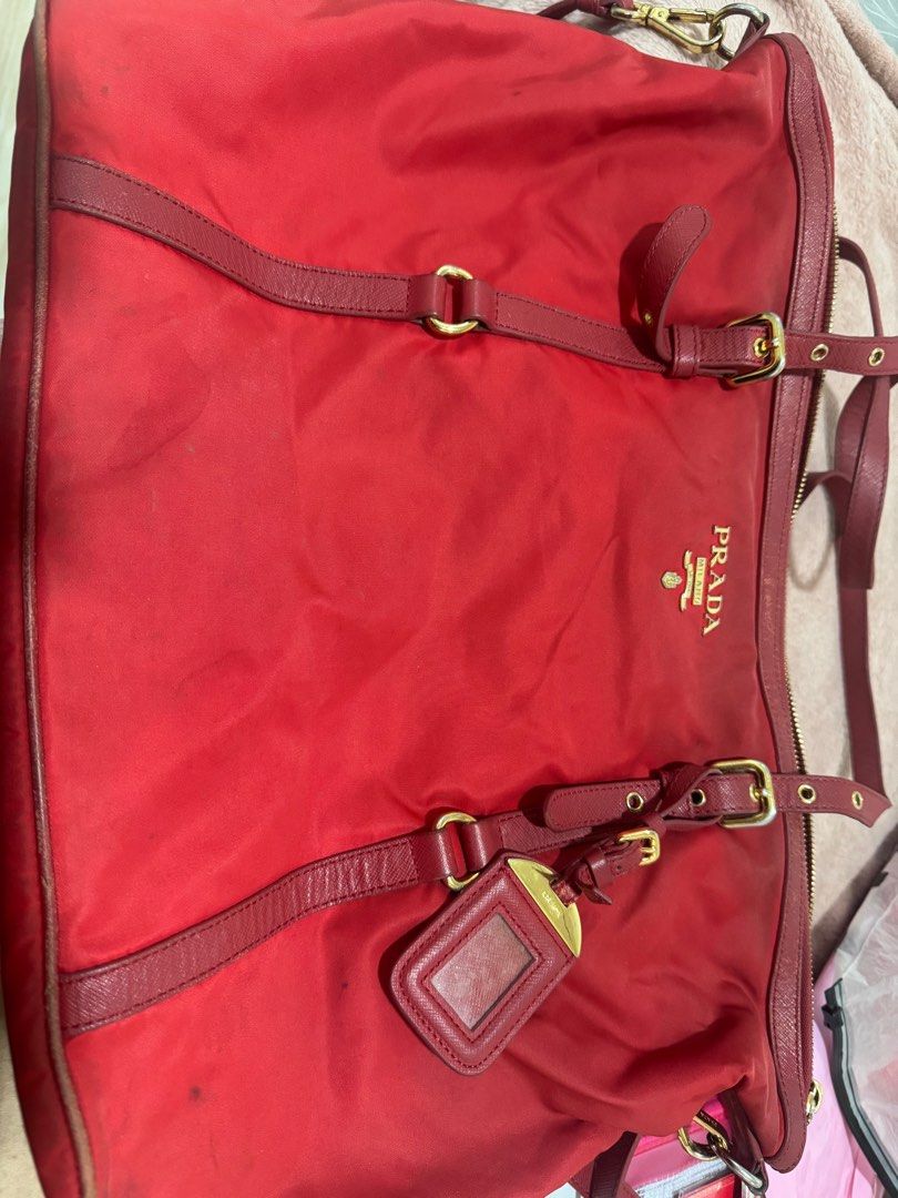 Prada Tessuto (Category: Luxury Bags & Wallets) located in Manila. Submitted by geeelt (Listing ID 1413502755, Image 1). Description: Rfs: decluttering bags that don’t fit my stuff for school. Authentic Prada handbag Top handle Shoulder strap Luggage tag Needs washing Pipe can be replaced.